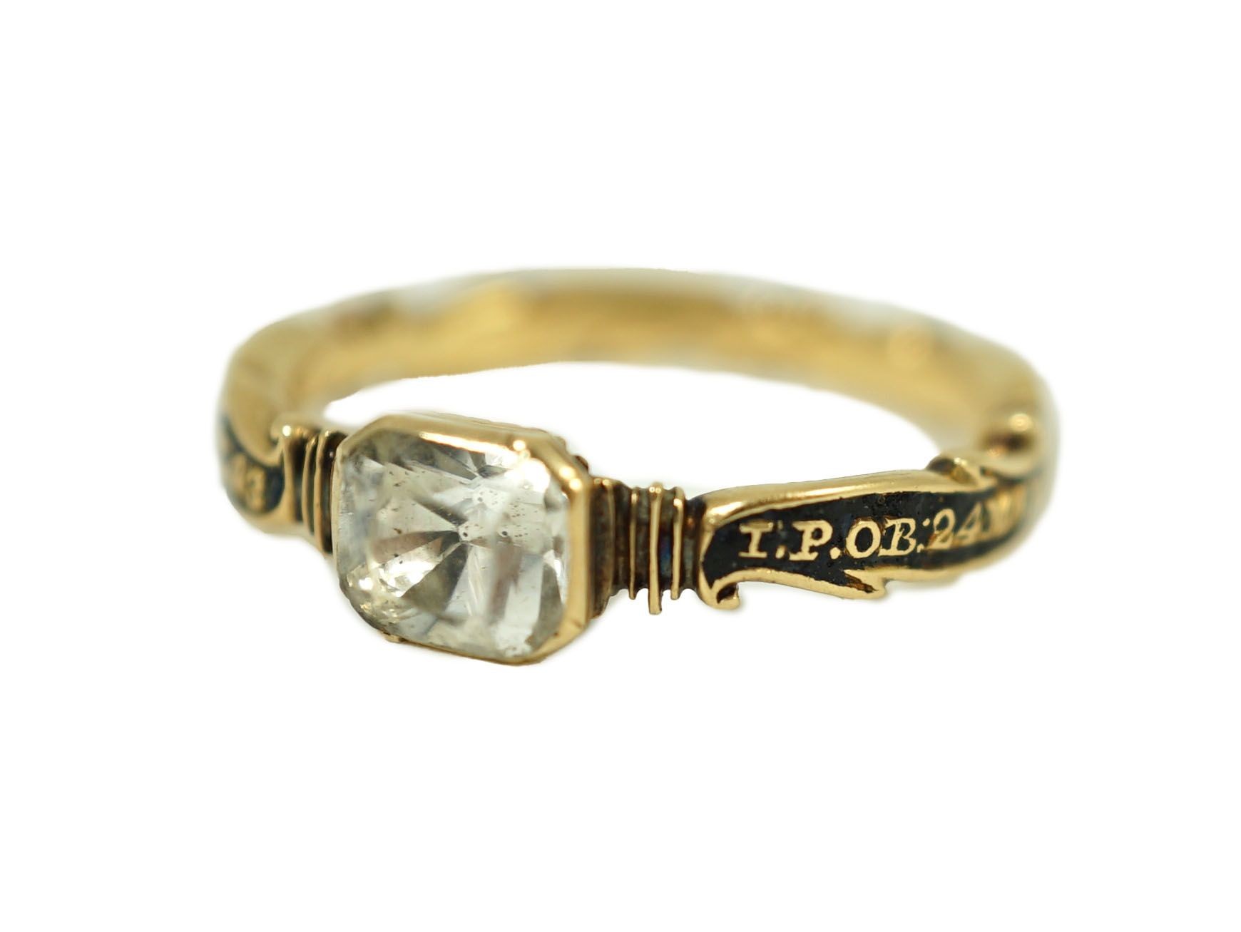 A George II gold, black enamel and rock crystal set mourning ring